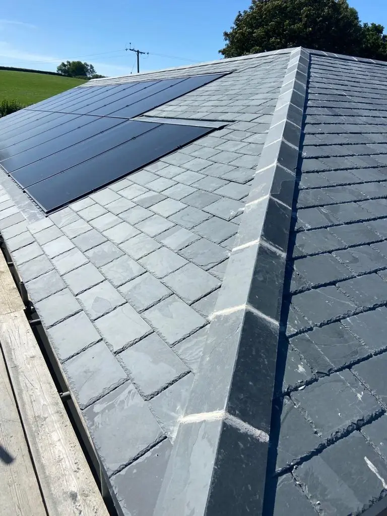 Solar panels on slate roof edge detail